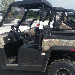 Walt's Tractor - Hisun Sector 450 parked in the lot
